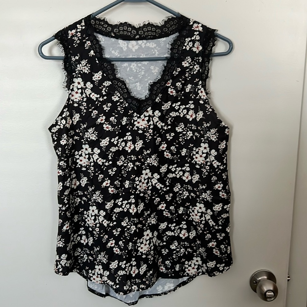 Perfect for spring and summer black and white flowered tank top.